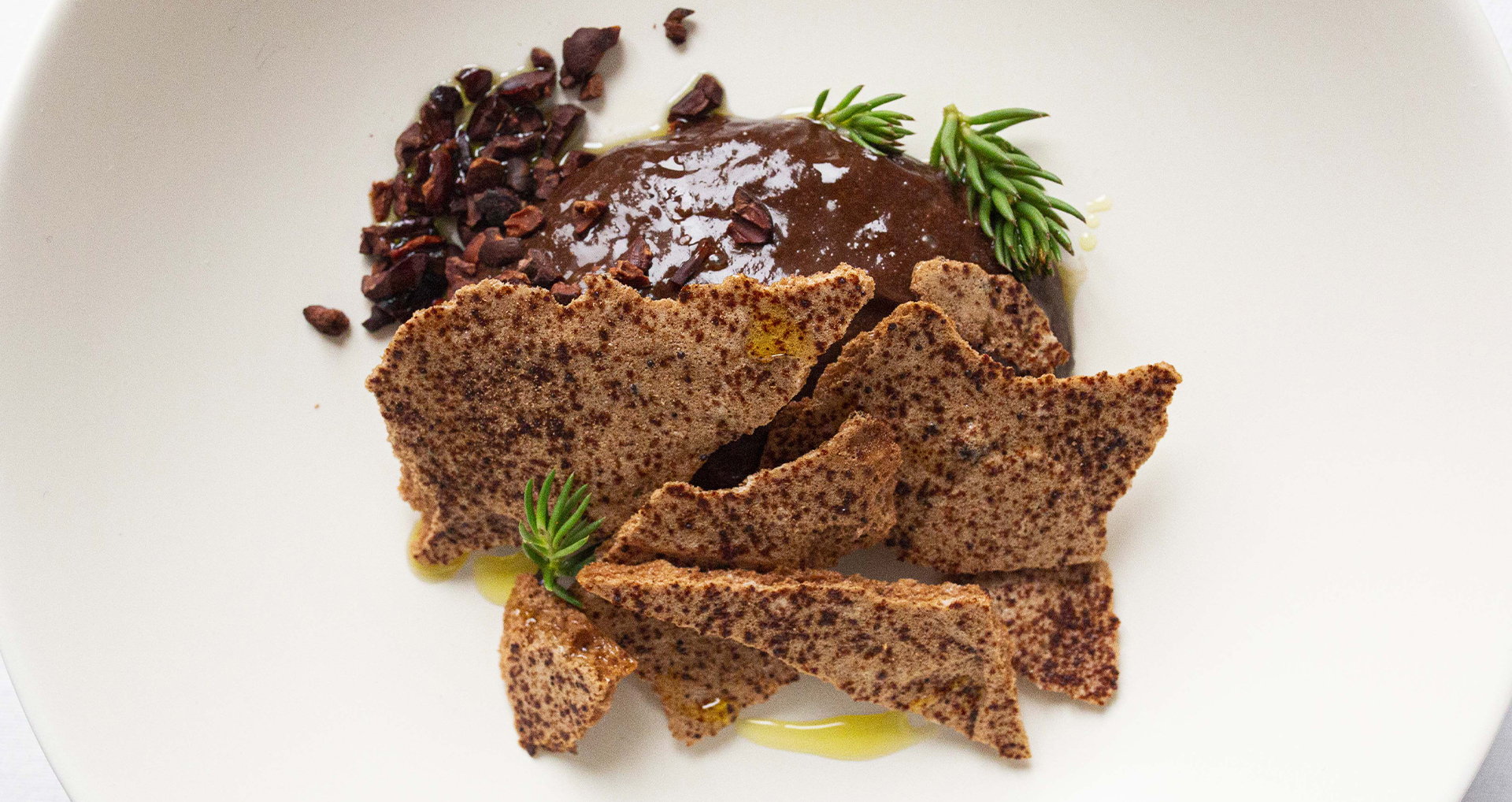 Chocolate ganache, meringues and cocoa nibs, olive oil