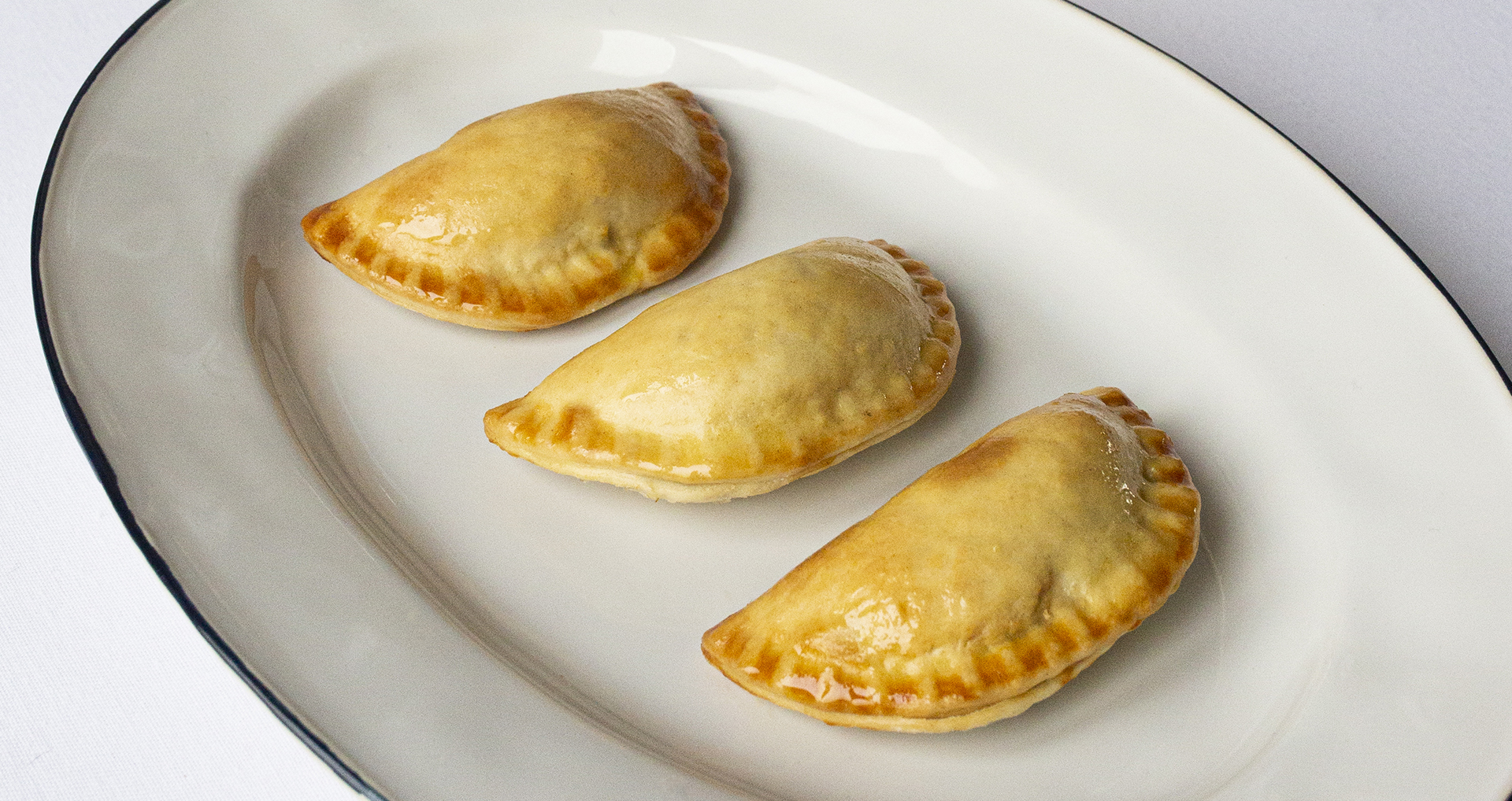 Black chorizo empanadas and tandoori mayonnaise