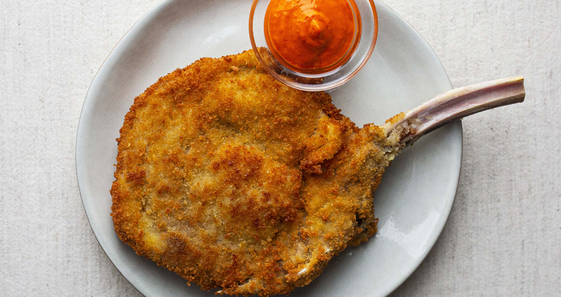 Milanesa de ternera y salsa de pimiento del piquillo