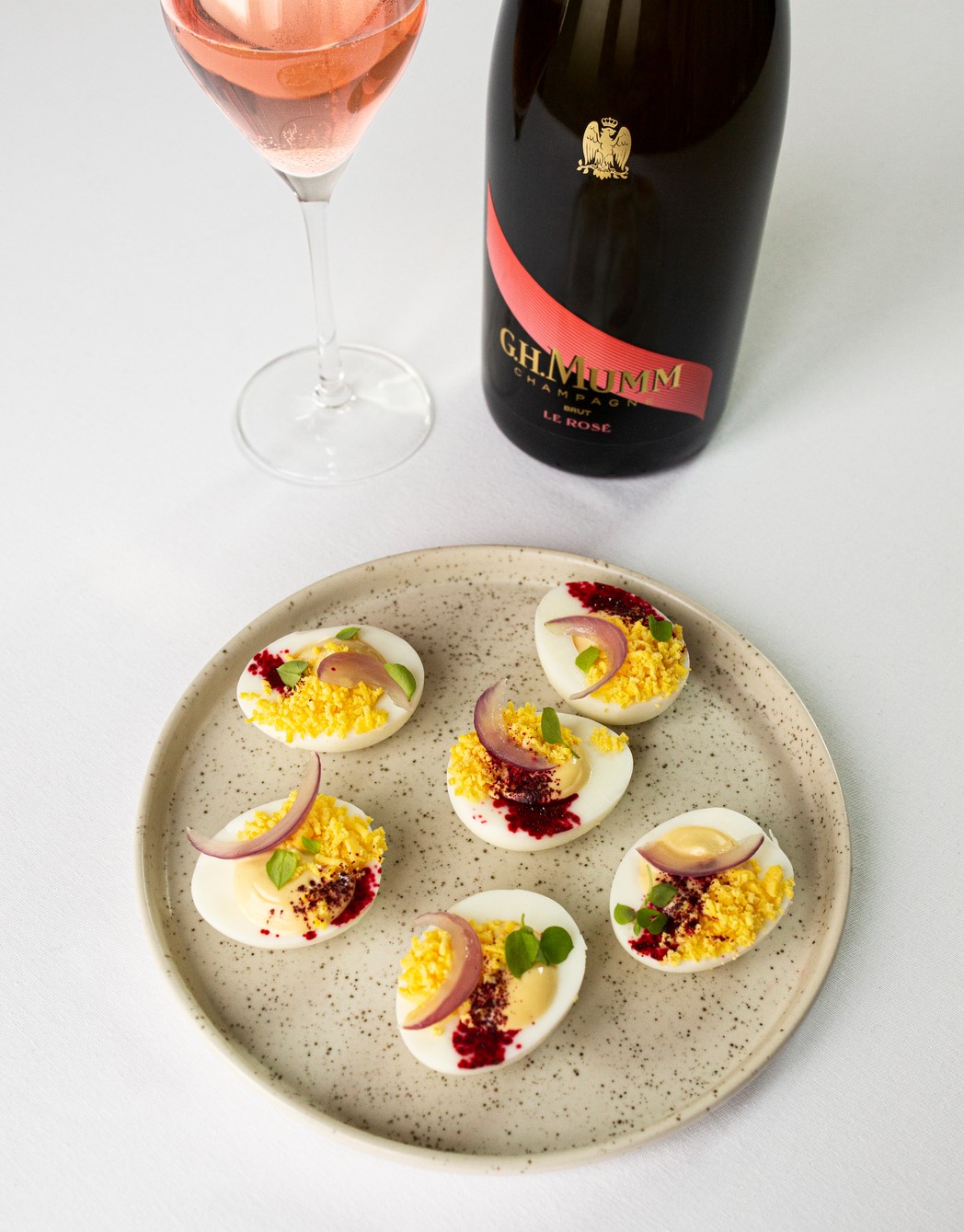 Eggs mimosa with hibiscus G.H.Mumm