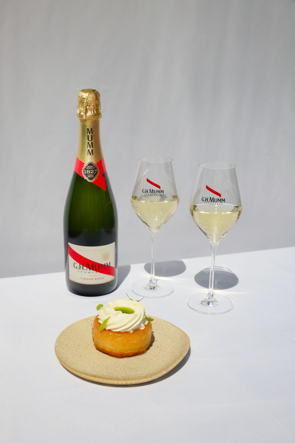 Chestnut flour baba, vanilla whipped cream, fig leaf oil