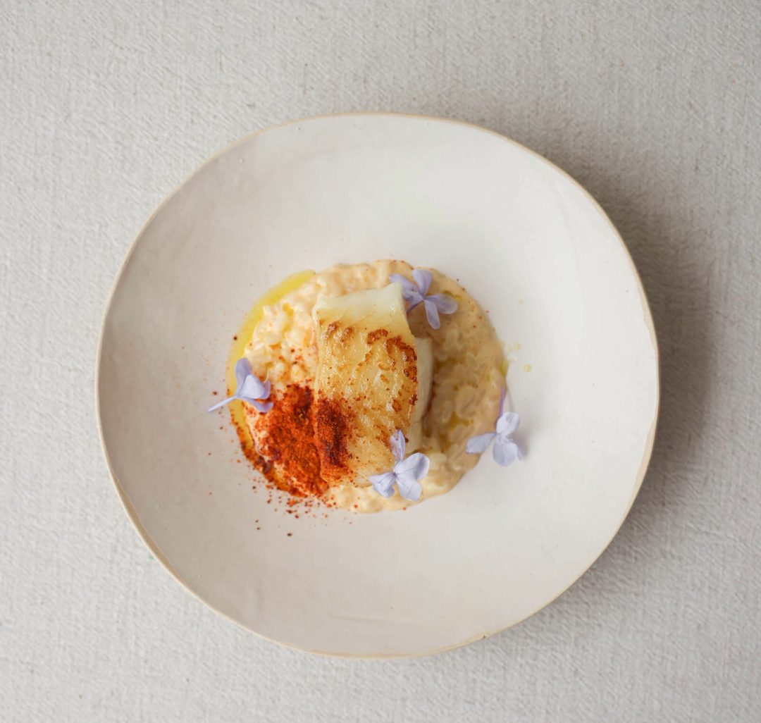 Cabillaud rôti Roasted cod, salted milk rice with butternut squash & bacon crumble - Mumm Cordon Rouge