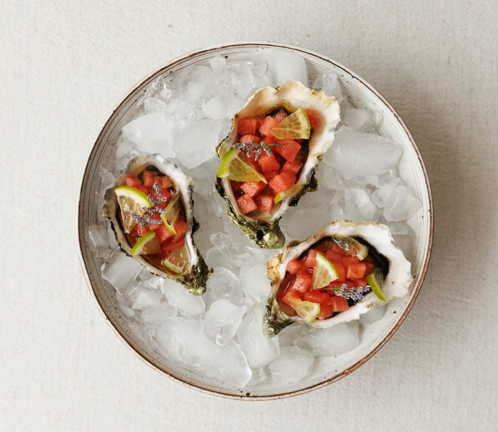 Fresh oysters, watermelon-lime mignonette & thyme olive oil - pairing Rosé champagne
