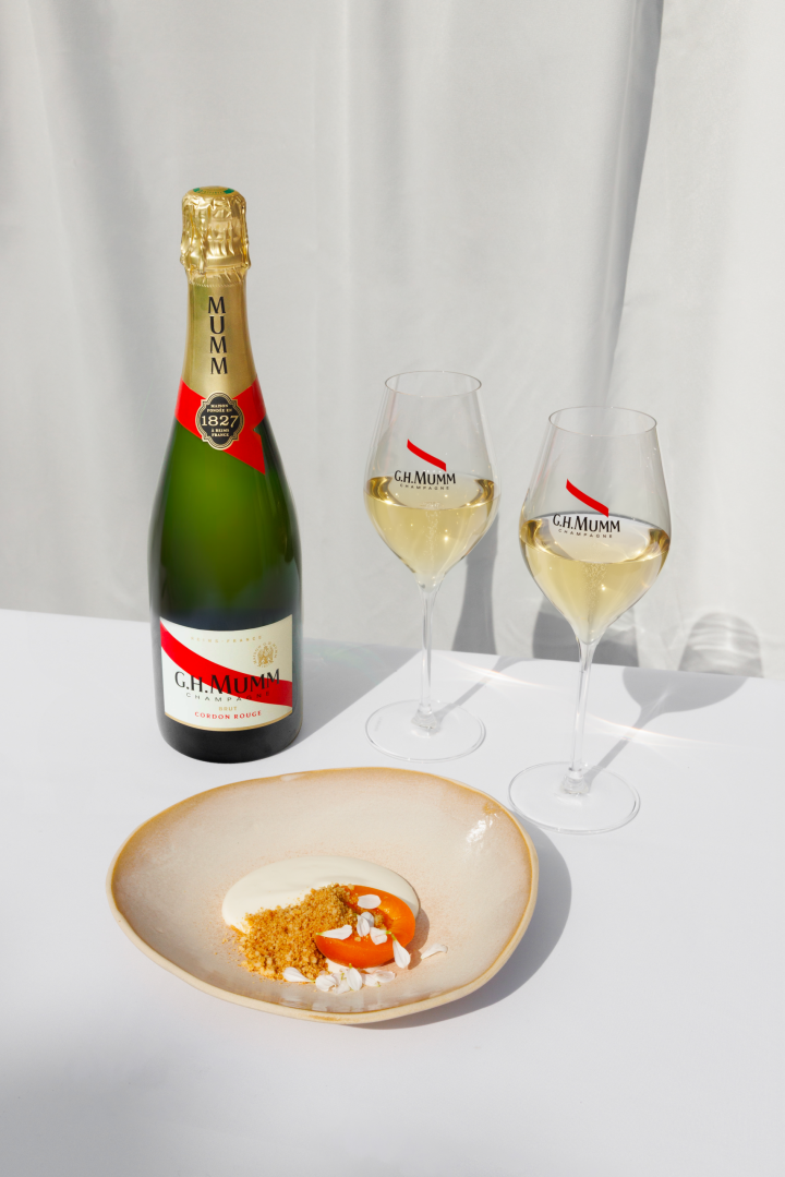 Apricots in rooibos syrup, crispy biltong & light fermented milk mousse